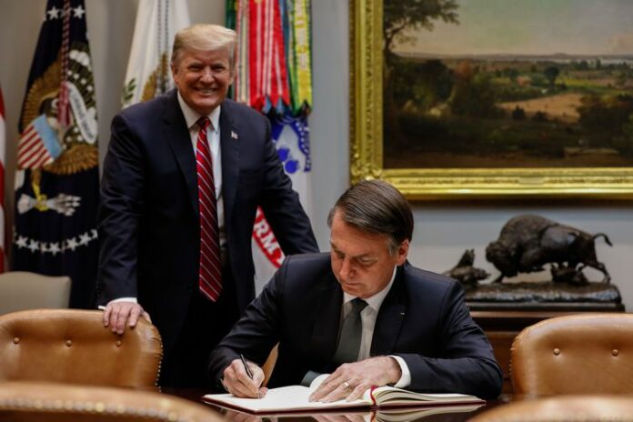 O presidente do Brasil, Jair Bolsonaro, durante encontro com o presidente dos EUA, Donald Trump, na Casa Branca, em Washington (EUA).